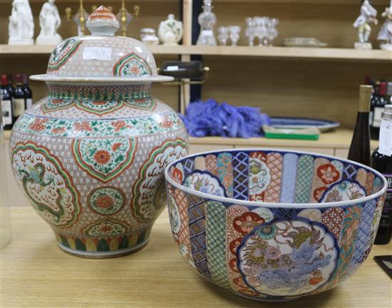 A Chinese lidded ceramic vase and a Japanese Imari ceramic bowl